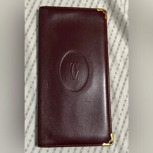 Burgundy Cartier Leather Wallet with Gold Accents, very good condition!